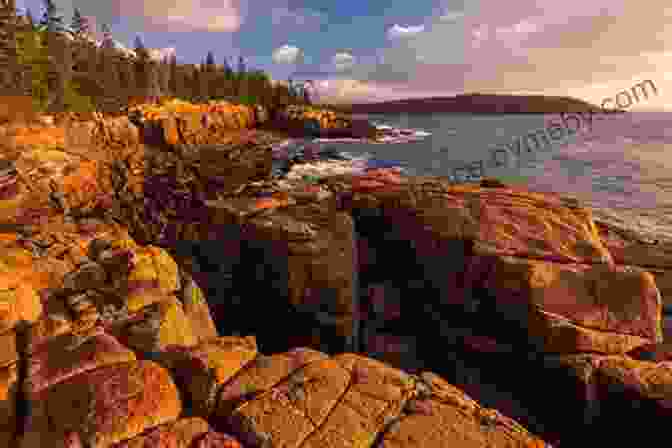 A Breathtaking View Of Acadia National Park, Showcasing Its Rugged Coastline, Granite Peaks, And Pristine Lakes The Prince Of Acadia The River Of Fire