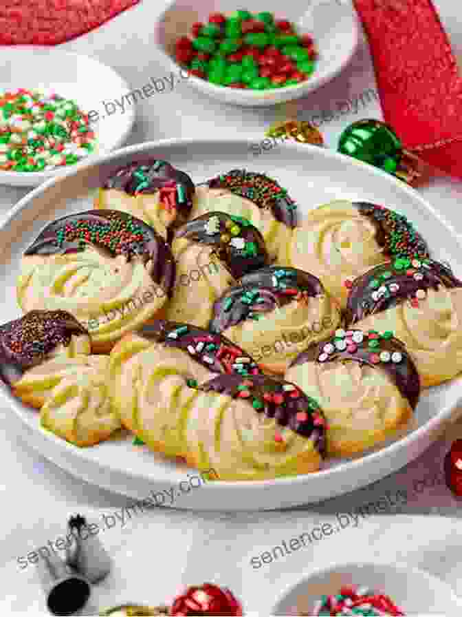 A Close Up Of Festive Christmas Cookies Arranged On A Red Plate, Decorated With Colorful Sprinkles And Piped Icing The Christmas Cookie Cookbook 2024 : Over 180 Amazing Christmas Recipes To Bake For The Holidays (Recipes To Bake For The Holidays)