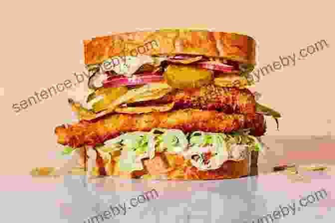 A Crispy Fried Seafood Sandwich, Featuring A Flaky Fish Fillet, Lettuce, Tomatoes, And Pickles On A Soft Bun The Southern Po Boy Cookbook: Mouthwatering Sandwich Recipes From The Heart Of New Orleans