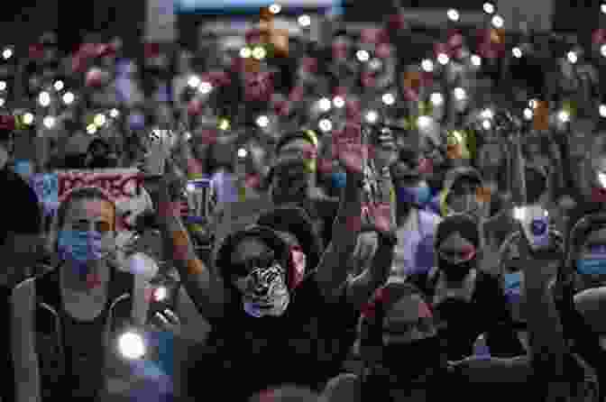 A Crowd Of Protesters Singing 50 Years Of Rolling Stone: The Music Politics And People That Shaped Our Culture