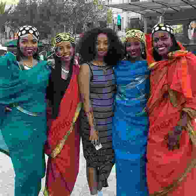 A Group Of Smiling Sudanese People, Dressed In Traditional Clothing Six Months In Sudan: A Young Doctor In A War Torn Village