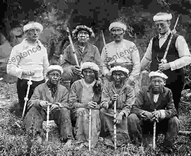 A Group Of Yahgan People, Their Faces Painted And Adorned With Intricate Body Art. The 1886 Exploration Of Tierra Del Fuego