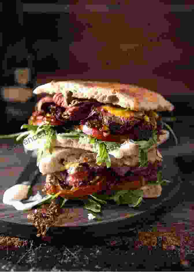 A Juicy Grilled Meat Sandwich, Featuring A Tender Steak, Grilled Onions, Peppers, And Mushrooms On A Toasted Bun The Southern Po Boy Cookbook: Mouthwatering Sandwich Recipes From The Heart Of New Orleans