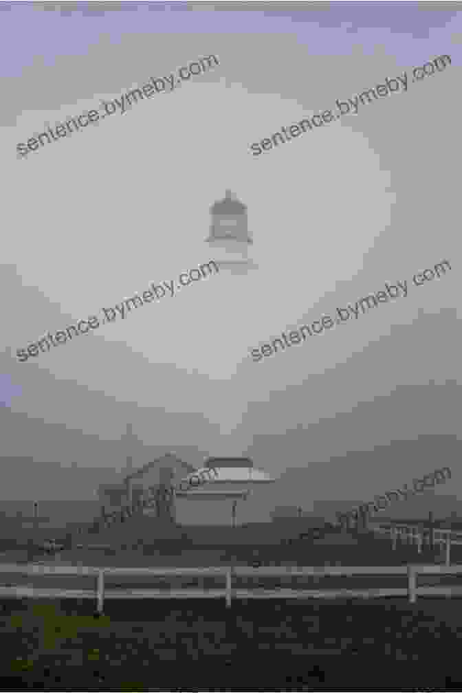 A Lighthouse Shrouded In Fog, Symbolizing The Isolation And Mystery Of Thomas Wake's Existence The Bleak And Empty Sea: The Tristram And Isolde Story (The Merlin Mysteries)