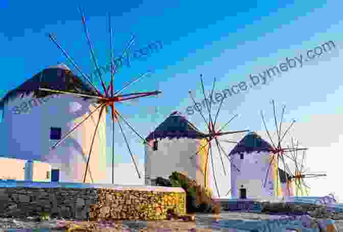 A Panoramic View Of Mykonos Town With Whitewashed Buildings And Windmills Against The Blue Aegean Sea Lonely Planet Best Of Greece The Greek Islands (Travel Guide)