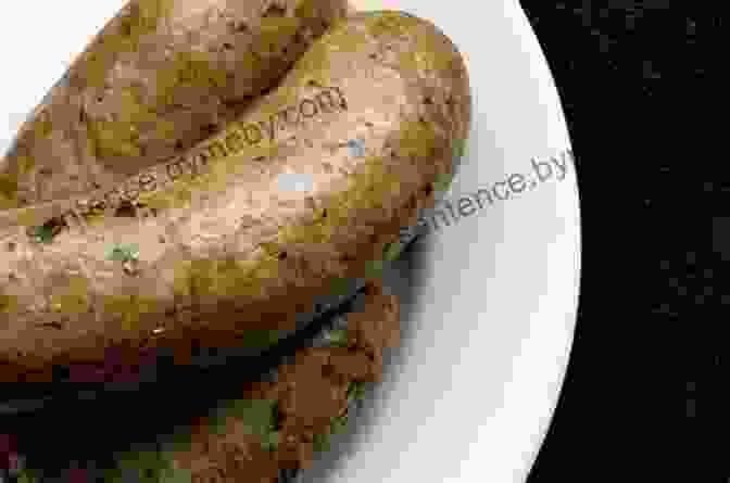 A Plate Of Golden Brown Boudin Sausages, Ready To Be Enjoyed Mouthwatering Cajun Recipes That Are Not Only Etouffee And Jambalaya : The Best Cajun Cookbook For Beginners And Pro Chefs