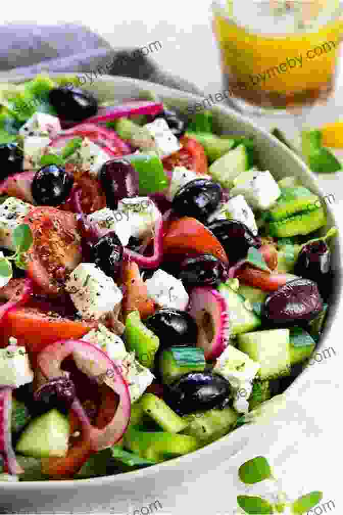 A Refreshing And Flavorful Greek Salad, Featuring A Blend Of Crisp Cucumbers, Juicy Tomatoes, Tangy Feta Cheese, And Aromatic Olives, Drizzled With A Tangy Lemon Oregano Vinaigrette. Burger Night: Dinner Solutions For Every Day Of The Week (Williams Sonoma)