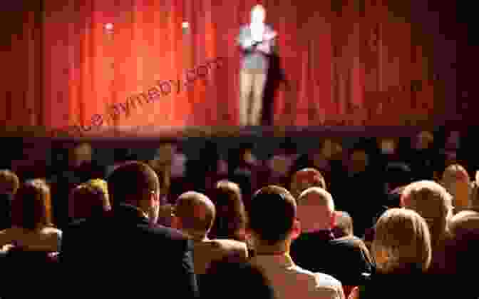 A Stand Up Comedian Performing On Stage, Making The Audience Laugh Zen And The Art Of Stand Up Comedy