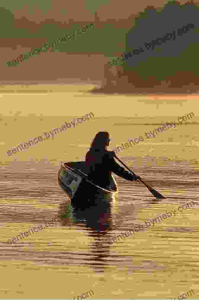 A Woman Paddling A Canoe On A Tranquil Lake Surrounded By Dense Forests Woman Of The Boundary Waters: Canoeing Guiding Mushing And Surviving (Minnesota)