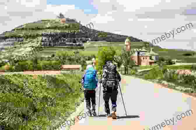 Pilgrims Walking Along The Camino De Santiago Camino De Santiago: To Walk Far Carry Less