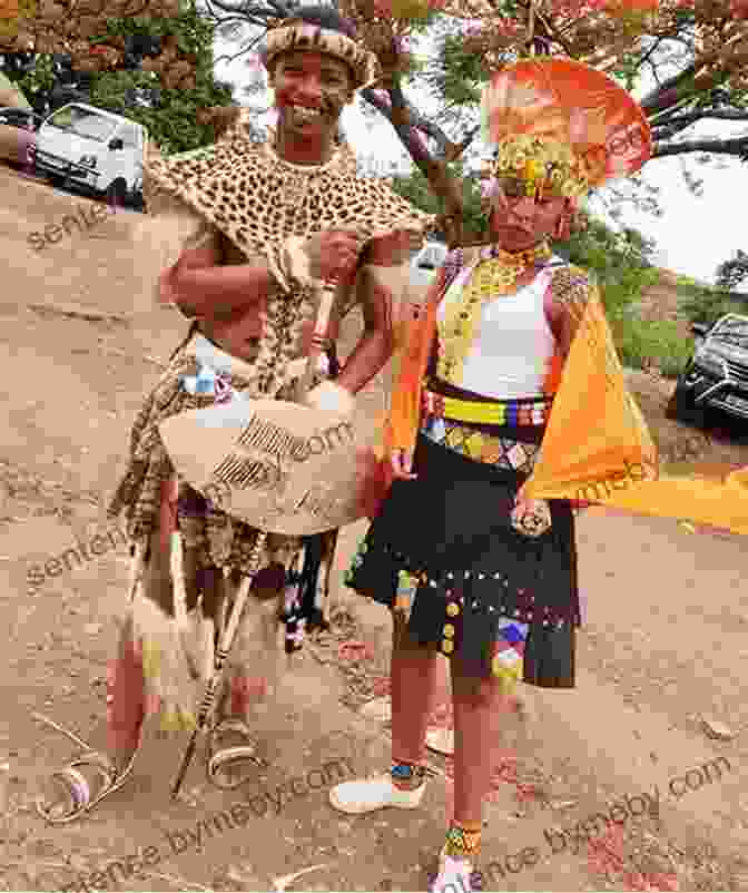 Richard Spilsbury, Clad In Traditional Zulu Attire, Stands Among A Group Of Zulu Warriors. His Face Reflects A Deep Respect For The Culture He Immersed Himself In. Shaka Zulu (Hero Journals) Richard Spilsbury